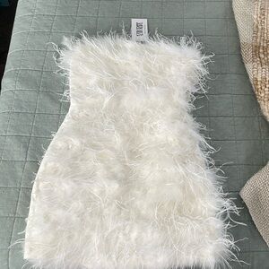 12th tribe feather dress never worn